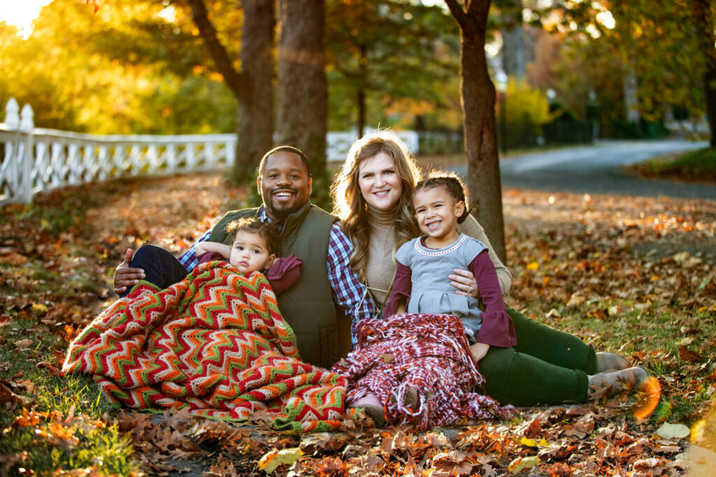 Photo of a mother and father with their two kids
