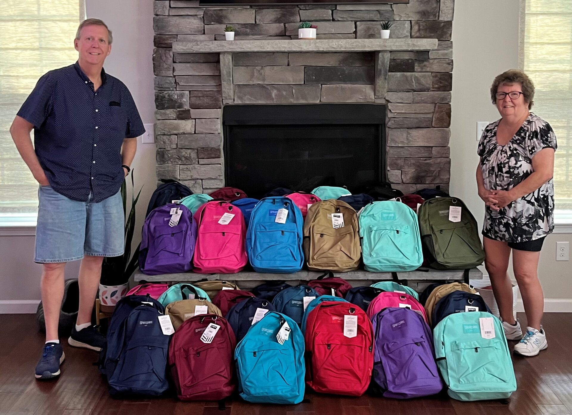 Local Family Donates 41 Backpacks To Beech Acres Parenting Center